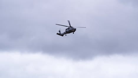 MH-60R-Seahawk-Helicopter-Against-Overcast-Sky---low-angle