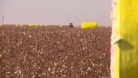 Harvesting-Cotton-and-Turning-It-Into-Bales-on-a-Farm