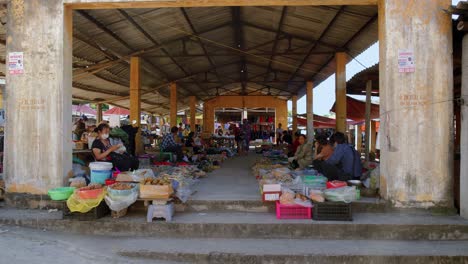 Asian-vendor-families-making-a-living-selling-essentials-at-Dong-Ba-Market