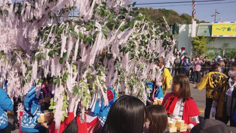 Free-Sake-Being-Handed-out-at-Japanese-Festival,-Hounensai-Fertility-Festival