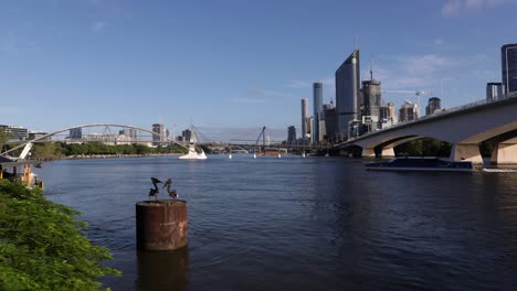 View-of-Brisbane-City-and-a-citycat-from-The-Cliffs-Boardwalk-at-Kangaroo-Point