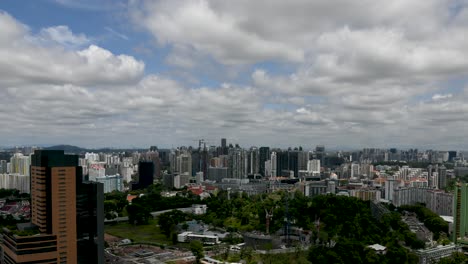 Time-lapse-of-the-Orchard-Road-area-with-Bukit-Timah-hill-in-the-background