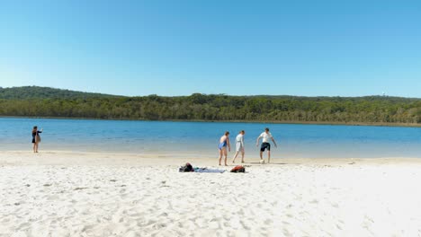 tourists-on-Brown-lake,-eucalyptus-lake,-north-stradbroke-island,-queensland,-Australia