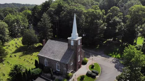 4K-Drone-shot-panning-over-old-stone-church