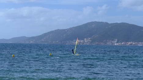 Windsurfer-surfing-in-the-waters-of-Ajaccio-bay-on-a-beautiful-sunny-day