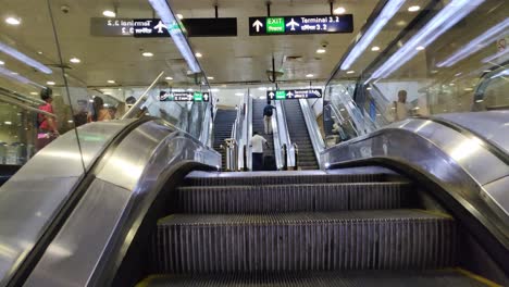 An-empty-escalator-in-airport-metro-of-new-Delhi-moving-in-forward-direction-towards-the-top