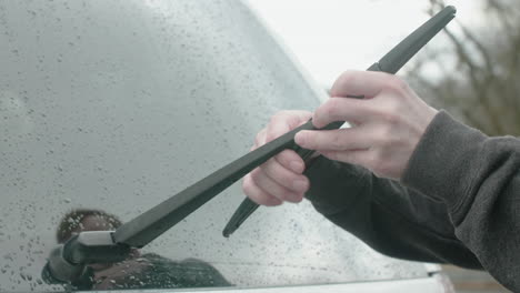 Removing-Old-Rear-Wiper-Blade-From-Car-TILT-UP