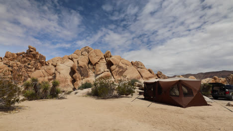 Campsite-setup-in-Joshua-Tree-National-Park-in-Indian-Cove-Campground-on-a-windy-spring-day-in-California