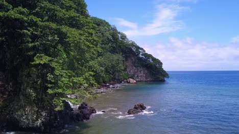 coco-island-wild-coastal-terrain-with-waterfall
