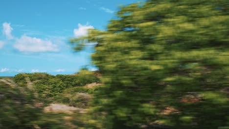 The-Beautiful,-Stunning-View-Of-The-Landscape-In-Curacao-From-A-Moving-Car---Wide-Shot
