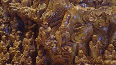 Chinese-art-history-scroll-painting-carved-into-thousand-year-old-Camphor-tree-trunk-wooden-carving