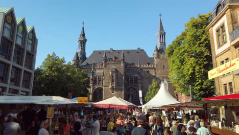 Wine-festival-with-people-and-market-stands,-located-on-the-Katschhof-square-in-the-German-city-of-Aachen