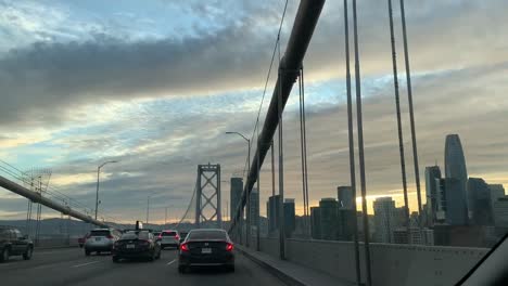 Passenger-POV-driving-over-the-famous-Bay-Bridge-connecting-Oakland-to-San-Francisco