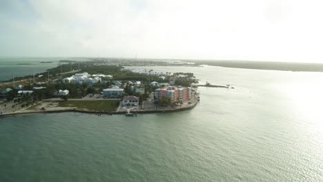 Aerial-View-of-Resort-on-Knight's-Key-in-Marathon-Florida-Surrounded-by-Water-On-a-Beautiful-Day-Tracking-Right
