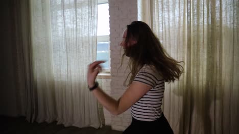 High-frame-rate-teenage-girl-dancing-in-the-studio-alone