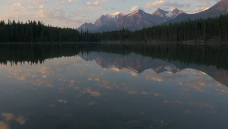 Mountain-Range-Reflection-In-Herbert-Lake-Early-Morning-Calm-Lake-Waters