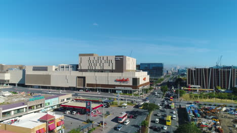 Dolly-In-Aerial-Shot-Of-Ayala-Mall-In-Aseana-City,-Manila-Philippines