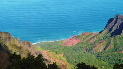 HD-Hawaii-Kauai-slow-motion-static-of-a-beautiful-elevated-ocean-view-from-Pu'u-O-Kila-Lookout-with-the-wake-of-a-boat-in-the-distance-just-offshore
