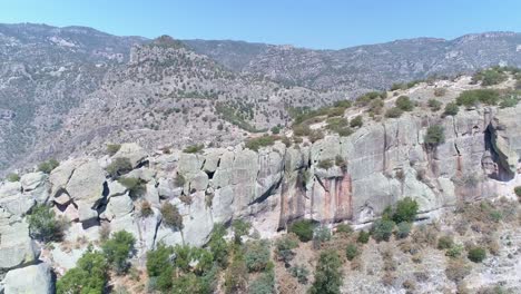 Aerial-pull-back-shot-at-and-the-Urique-Canyon-in-Divisadero,-Copper-Canyon-Region,-Chihuahua
