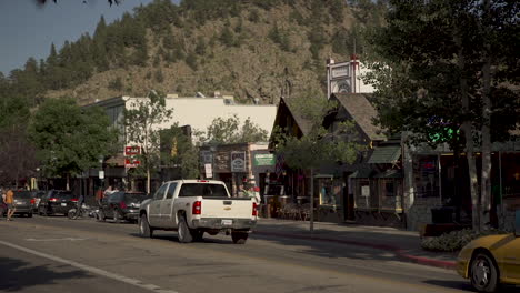 Slider-shot-of-tourists-on-main-street-in-a-small-Colorado-mountain-town