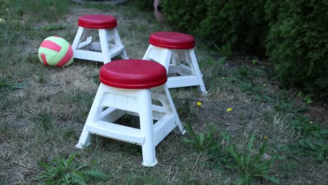 Three-red-chairs-in-the-yard