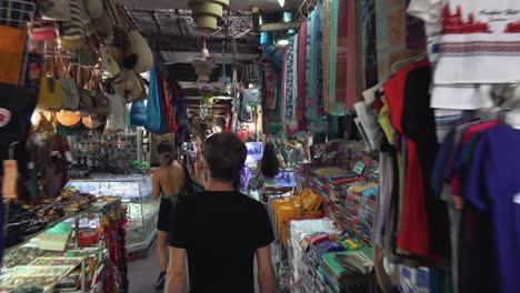 Male-Tourist-Exploring-the-Shops-of-the-Old-Market