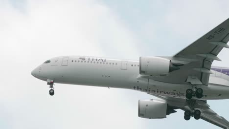 Thai-Airways-Airbus-A350-941-HS-THB-approaching-before-landing-to-Suvarnabhumi-airport-in-Bangkok-at-Thailand