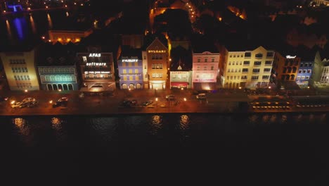 Aerial-view-of-Willemstad-the-capital-city-of-the-Dutch-Caribbean,-Curacao-at-night