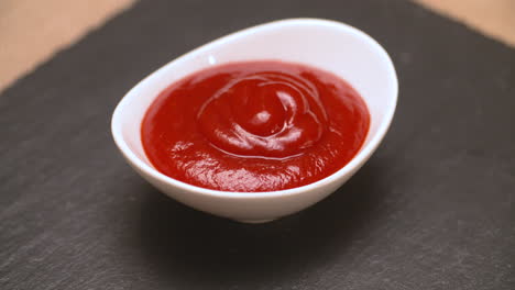 Small-serving-dish-filled-with-ketchup-for-dipping