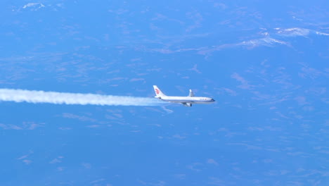 Air-China-airliner-producing-contrails,-cruising-at-high-altitude