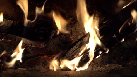 Closeup-of-logs-in-wood-burning-stove.-UK