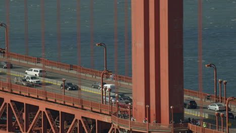 Cars-are-crossing-the-golden-gate-bridge-on-sunny-day-in-San-Francisco,-California