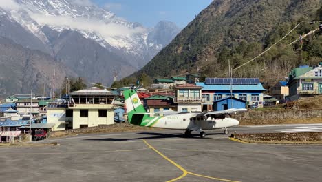Lukla,-Nepal---March-9,-2021:-A-plane-coming-into-the-Lukla-Airport-in-the-Himalaya-Mountains-of-Nepal