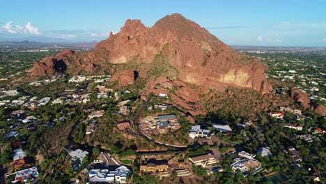 Phoenix,-Arizona-USA---8-10-2021:-High-altitude-aerial-tilt-reveals-of-Echo-Canyon-Trailhead-at-Camelback-Mountain