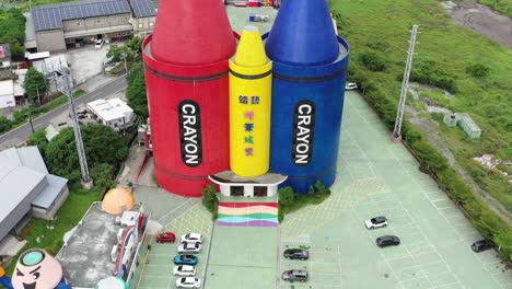 Front-view-aerial-shot-capturing-lucky-art-crayon-factory,-DIY-experience-center-for-children-and-family-located-at-Yilan-County,-Taiwan