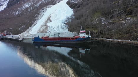 Cargo-ship-Peak-Bergen-from-peakgroup-loading-in-port-of-Gudvangen-Norway