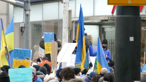 Crowds-At-Pro-Ukrainian-Rally-Taking-Place-At-Nathan-Phillips-Square-Walking-Past-in-Toronto-On-February-27-2022