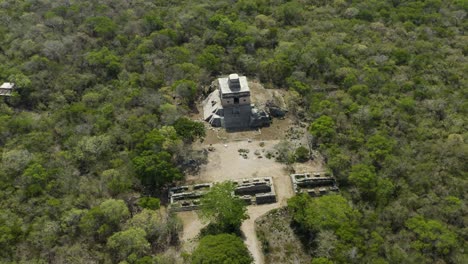 Aerial-view-of-Dzibilchaltun-Maya-culture-archeological-site-in-the-jungle,-Yucatan,-Mexico