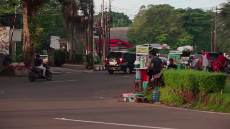 food-seller-called-"Pedagang-kaki-Lima"-on-the-side-of-road-in-the-morning,-Semarang,-Central-Java,-Indonesia-on-June-10,-2022