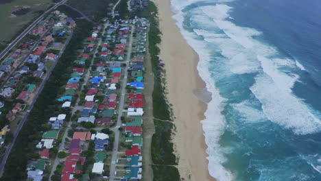 4k-drone-footage-of-a-coastline-alongside-a-city