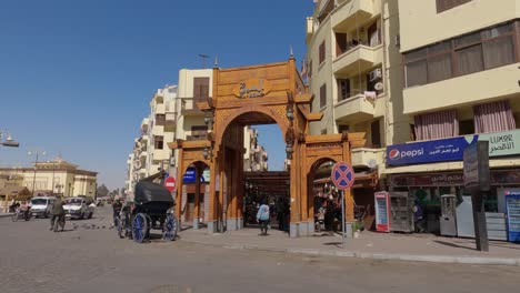 View-of-the-entrance-to-the-street-shops,-the-entrance-to-the-bazaar-in-old-part-of-Luxor,-Egypt