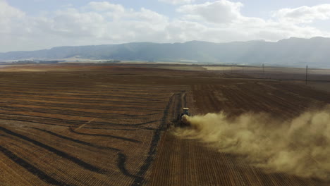 4k-drone-footage-of-a-tractor-ploughing-a-field