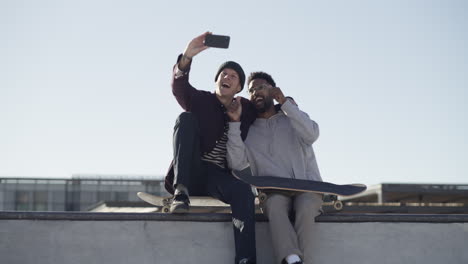 two-skaters-taking-a-selfie-at-the-skate-park