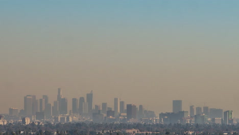 Tilt-down-from-blue-skies-to-the-smog-filled-downtown-of-Los-Angles