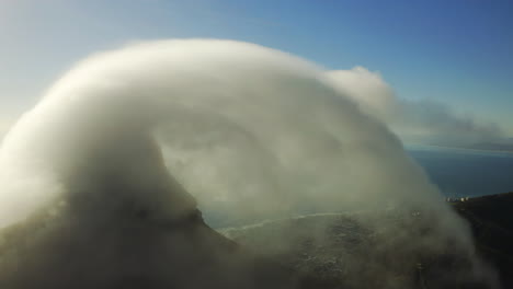4k-drone-footage-of-clouds-around-a-mountaintop