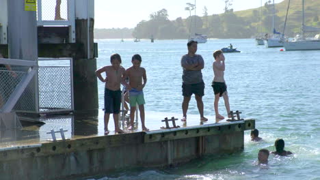 Kids-jumping-off-Pilot-Bay-Wharf