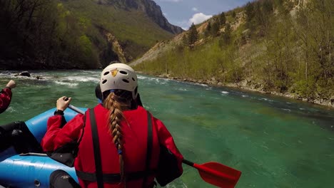 Paddling-on-a-rafting-boat,-paddler-point-of-view