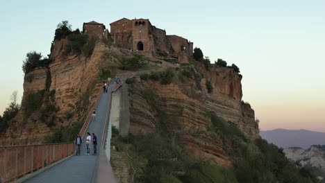 Close-view-of-Civita-di-Bagnoregio-“The-dying-city”-from-the-walking-bridge-during-sunset