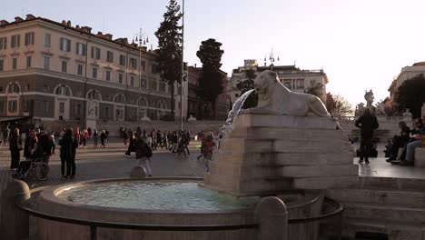 Lion-Fountains-at-People's-Square-in-Rome-city-centre-with-tourists-in-the-background