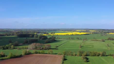a-drone-flight-over-fields-in-spring